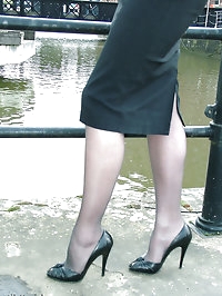 Black nylons and high heels feature in this sexy outdoor..