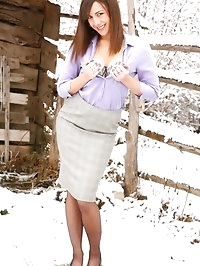 Emma H looking stunning in the snow in her sexy secretary..